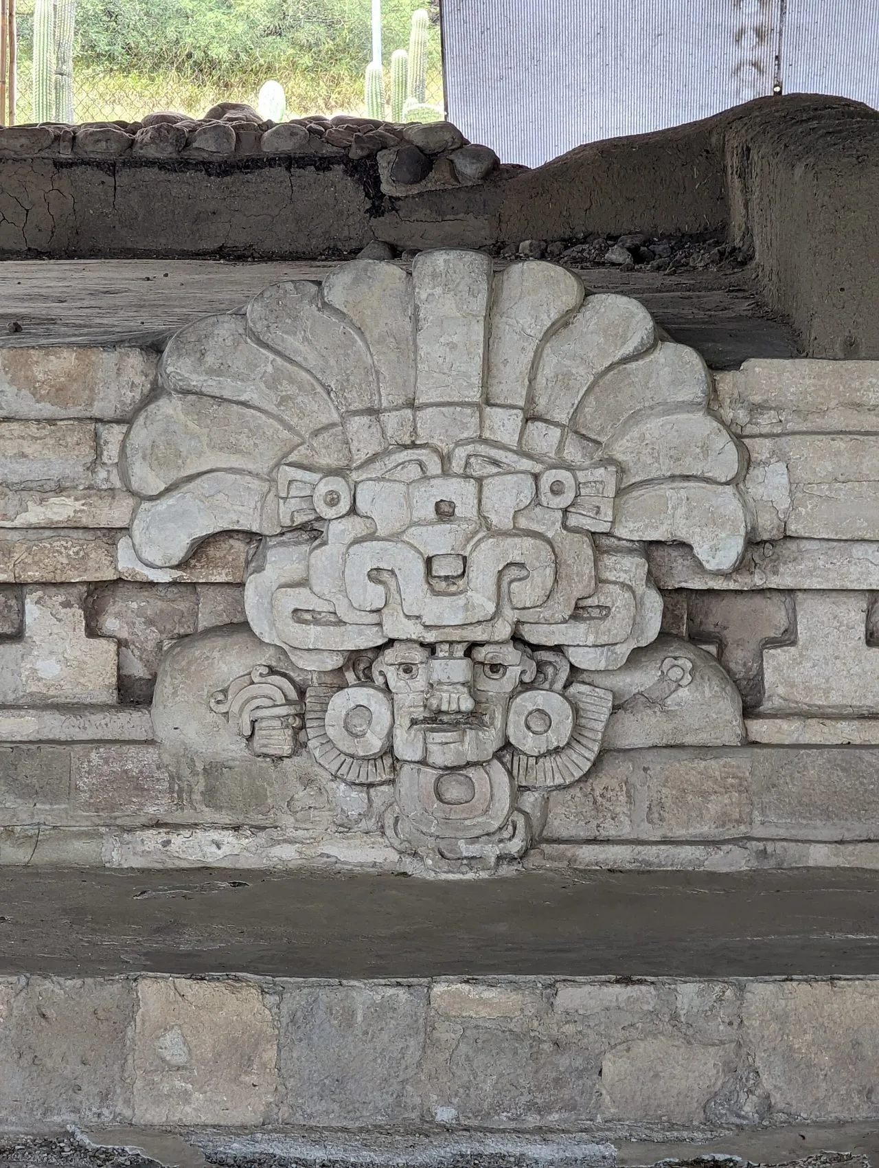 A stucco mask of Cocijo, the rain god, at Lambityeco